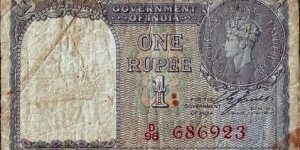 India 1940 1 Rupee.

Red serial number.

This note is believed to have been issued under the Dominion of India (1947-50).

Extremely rare in any grade! Banknote