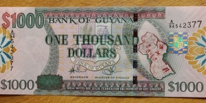 Guyana |
1,000 Dollars, 2009 |

Obverse: Coat of Arms and Map of Guyana |
Reverse: Bank of Guyana building |
Watermark: Head of a Macaw parrot Banknote