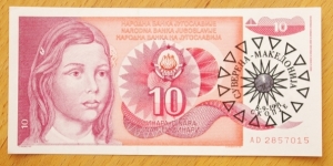 Sovereign Macedonia | 
10 Dinara, 1991 | 

Obverse: Young Southern Slavic girl, Yugoslav National Coat of Arms and Overprint of the Macedonian sun with country name and new date | 
Reverse: Abstract potpourri hotchpotch of numbers and letters with a pixelized eye in the middle | 
Watermark: School girl | Banknote