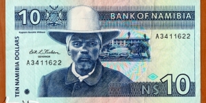 Namibia | 
10 Dollars, 1993 | 

Obverse: Hendrik Witbooi (c. 1830-1905) (a.k.a. ǃNanseb gaib ǀGâbemab (the captain who disappears in the grass)) was a chief of the ǀKhowesin people, Parliament building in Windhoek, and Namibian Coat of Arms | 
Reverse: Springbok antelopes (Antidorcas marsupialis), and Namibian flag | 
Watermark: Chief Hendrik Witbooi | Banknote