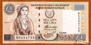 Cyprus | 
1 Lira, 2004 | 

Obverse: Cypriot girl in traditional costume, and the National Coat of Arms | 
Reverse: Cypriot handicrafts, and Kato Drys village scene | 
Watermark: Bust of Aphrodite | Banknote