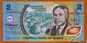 Samoa | 
2 Tala, 1990 | 

Obverse: His Royal Highness Malietoa Tanumafili II (Susuga) (1913-2007), Beach Road in the Samoan capital Apia and the village Mulivai, Immaculate Conception of Mary Roman Catholic Cathedral built in 1885, and Traditionall houses (Fales) | 
Reverse: Samoan family scene in Samoan Fale, and National Coat of Arms | 
Window: Kava Bowl | Banknote