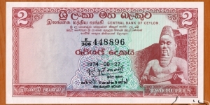 Ceylon | 
2 Rupees, 1974 | 

Obverse: Statue of Mahā Parākramabāhu I (1123–1186), King of Polonnaruwa (ruled from 1153 to 1186) | 
Reverse: A Buddhist structure, Vatadage, in Medirigiriya built during the Anuradhapura period | 
Watermark: A Lankese lion |  Banknote