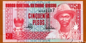 Guinea-Bissau | 
50 Pesos, 1990 | 

Obverse: Pansau Na Isna | 
Reverse: Villagers | 
Watermark: BCG | Banknote