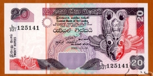 Sri Lanka | 
20 Rupees, 2005 | 

Obverse: Garula (Destroyer of Snakes), and Bird mask | 
Reverse: Fisherman, Sea shells and Exotic fish | 
Watermark: The Ceylon Lion | Banknote