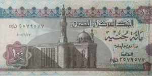 100 £ - Egyptian pound
Signature: Farouk Abdel Baky El Okda (2nd kind)
Dark brown and brown-violet on multicolored underprint. Sultan Hassan Mosque at lower left center. Sphinx at center on back. With wide segmented silver security strip and added rosette printed in optical variable ink.
 Banknote