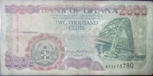 
2,000 GH₵ - Ghanaian cedi
Red-brown, green, and multicolored. Suspension bridge at right. Fisherman loading nets into boat at left center on back. Arms at lower left on face and as watermark. Banknote