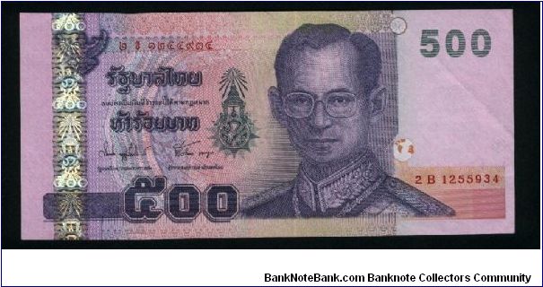 500 Bath.

Holographic foil strip at left.

King Rama IX on face; statue and palace on back.

Pick #107 Banknote