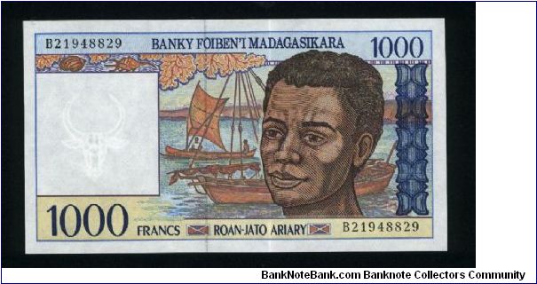 1000 Francs=200 Ariary.

Young man and boats on face; young women with basket of shellfish and fisherman with net on back.

Pick #76 Banknote