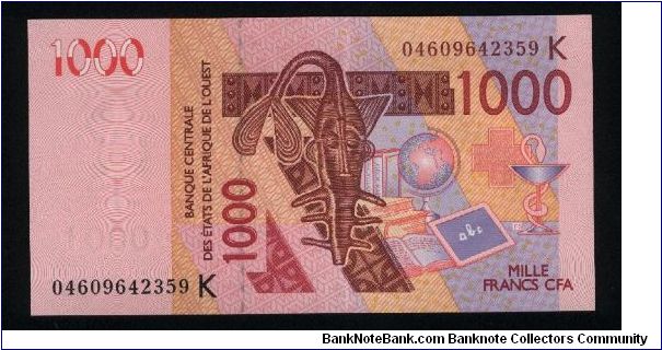 1000 Francs CFA.

Serial -K- prefix (Senegal).

Tribal mask on face; two dromedaries on back.

Pick #715K-a Banknote