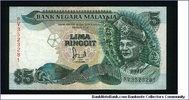 5 Ringgit.

Yang-Di Pertuan Agong, First Head of State of Mlalaysia (died 1960) on face; King's Palace at Kuala Lumpur on back.

Pick #35A Banknote