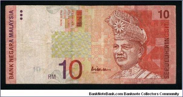 10 Ringgit.

Yang-Di Pertuan Agong, First Head of State of Mlalaysia (died 1960) on face; modern passenger train at left, passenger jet airplane, freighter ship at center on back.

Pick #42c Banknote