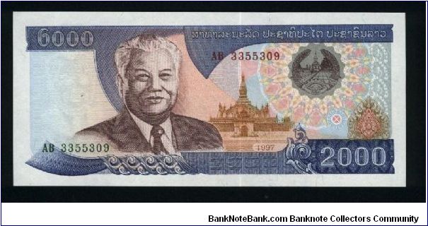 2000 Kip.

Kaysone Phomvihane at left, arms at upper right, temple in underprinting on face; hydroelectric complex at center on back.

Pick #33a Banknote