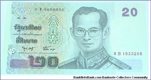 20 Baht. Commemorative issue. King Rama IX wearing Field Marshal's uniform.  Procession with King in military uniform and new bridge on back. Pick #110 Banknote