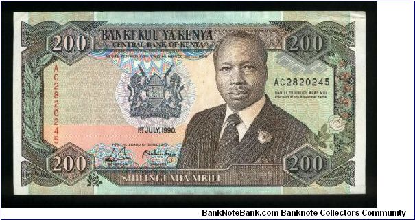 200 Shillings.

President Daniel Toroitich Arap Moi at right center, arms at left center on face; fountain at center on back.

Pick #29b Banknote