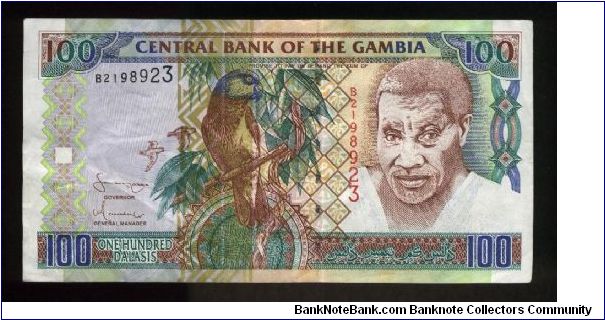 100 Dalasis.

Parrot at center, man at right on face; Arch 22 monument in Banjul on back.

Pick #24 Banknote