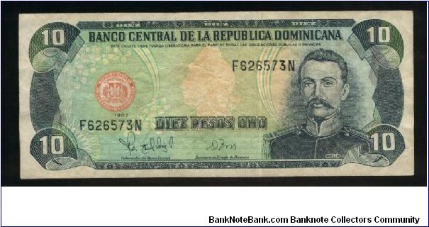 10 Pesos Oro.

Medallic Liberty head at center, Mella at right on face; quarry mining scene on back.

Pick #153a Banknote