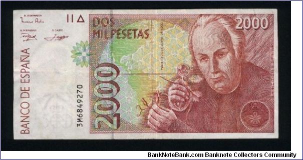 2,000 Pesetas.

Issued for the 5th Centennial of the Discovery of America by Spain; 1492-1992.

J. C. Mutis observing flower at right on face; Royal Botanical Garden and title page of Mutis' work on vertical format on back.

Pick #164 Banknote