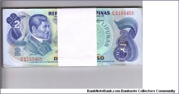 Stack of 100 consecutive number 2 Peso notes. Banknote