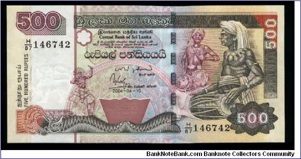 500 Rupees.

Musicians at right, dancer at left center on face; kingfisher above temple and orchids on back.

Pick #NEW Banknote