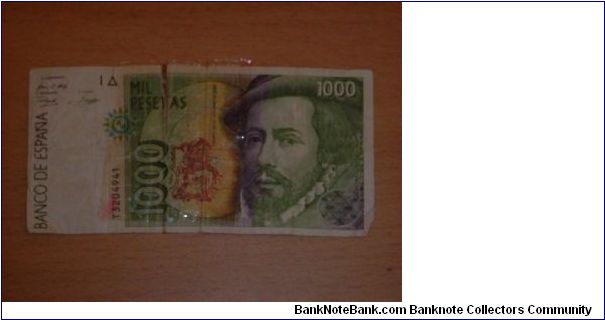 1000 pesetas, held together with tape Banknote