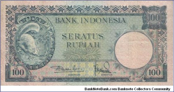 ANIMALS SERIES WITH NO:100F 83209. SIGNED BY MR SJAFRUDDIN PRAWIRANEGARA & TRB.SABAROEDIN. WATERMARK PRINCE DIPONEGORO.(O)A SQUIRREL(R)PALACE AR BOGOR.PRINTED BY THOMAS DE LA RUE & COMPANY. 158X81MM Banknote