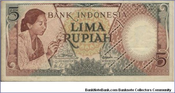 1958 Manual Worker 1st Series. Signed By Loekman Hakim & TRB Sabaroedin.(O)A Female Hand & Waxed Painter(R)A Native House.Watermark Buffalo Head. 135x65mm Banknote