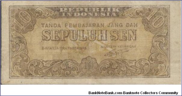 10 Cents.Dated 17 October 1945. Currency Of The Republic Of Indonesia Series,known as WHITE MONEY. Signed By AA Maramis(O)A Crossed Dagger And Machete(R)Law Text And Value.105x51mm Banknote
