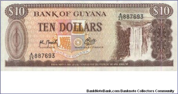 A Series 10 Dollars Bank Of Guyana. 
(O)Value and Kaieteur Falls(R)
Bauxite mining and aluminum plant
Printed By Thomas De La Rue & Company Limited,London.157x66mm. Security thread:
Yes.Watermark:
No Banknote