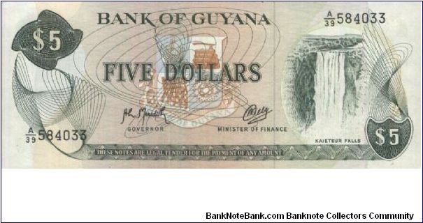 A Series 5 Dollars Bank Of Guyana.(O) Kaieteur Falls(R) cane sugar harvesting & conveyor.Printed By Thomas De La Rue & Company Limited,London.157x66mm. Security thread:
Yes.Watermark:
No Banknote