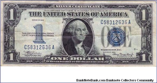 1934 Silver Certificate. This note has the same funny back but the Obverse has changed somewhat from the 1928. Nice Vf. Banknote