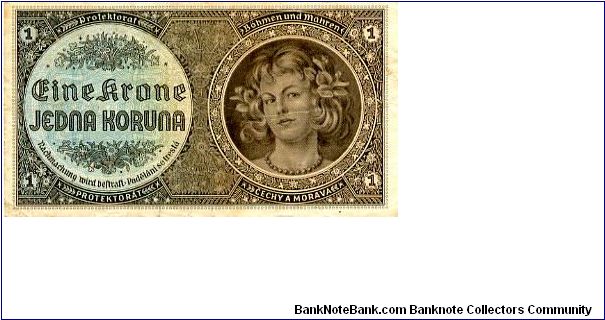 1K 1939
Blue/Gray/Red
Front  Value in corners, Value in German & Czech, Girls Head
Rev Value each side of Czech Lion top & Bottom
Watermark No Banknote