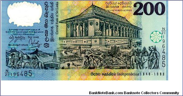 Sri Lanka Polymer 
200 Rupees 02/04/98
Blue/Yellow
50th Anniversary of Indipendence
Minister of Finance - C Kumaratunga (Prime Minister also)
Governor of Bank - A. Jayawardena.
Front See through window with heraldic lion, Bandaranaike Memorial International Conference Hall, scene's showing modern progress
Rev Temple of the Tooth at Kandy, Anciant historical scene's Banknote