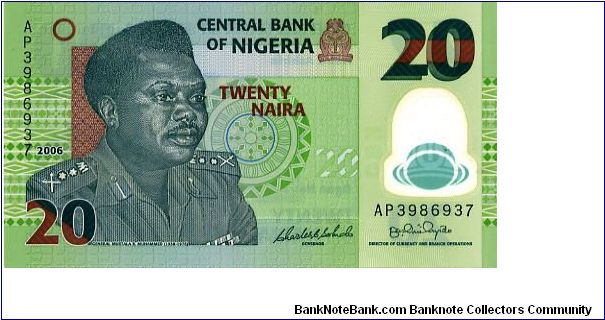 Nigeria Polymer
20n 2006
Green/Gray
Governor C C Soludo
Director of Currency & Branch Operations B C Onyido
Front General M R Muhammed (1938-1976) head of state and Nigeria's national hero. Bank of Nigeria's logo at upper right & in the clear window
Rev Dr L Kwali (c. 1925-1983), Nigeria's best known potter. A map of Nigeria,  Coat of Arms of Nigeria Banknote