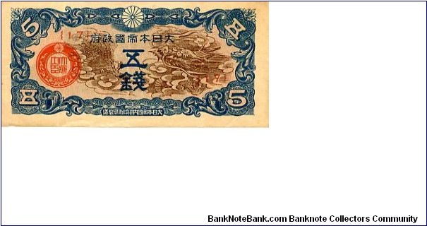 Japanese Military occupation of China 
5s 1939
Blue/Brown/Green/Red
Front Value in corners, Red seal, Dragon, Chrysanthanum top center,
Rev Value in Chinese & English each side of central script Banknote