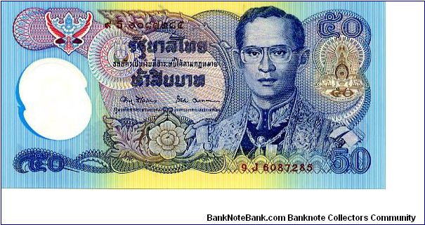 Polymer 
50b 1996 
Multi
50th anniversary of HM Bhumibol's accession to the Throne
Finance Minister A Viravan 
Governor R Marakanond
Front Coat of arms, Fancy seal, King Rama IX, Value above and in see through window
Rev  Rama VII on the throne. In 1932, during His reign, a coup d'état was staged, resulting in transferral of power to a Legislative Assembly—the 150-year absolute rule of the Chakri Kings ended and the Constitutional Monarchy of the present day was born. The Royal Palace at Banknote