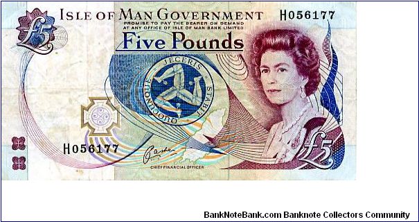 £5 1992
Blue/Purple
Chief Finacial Officer Cashen
Front Celtic cross, Trikelion in center, EII
Rev Castle Rushen 
Security thread
Watermark Trikelion Banknote