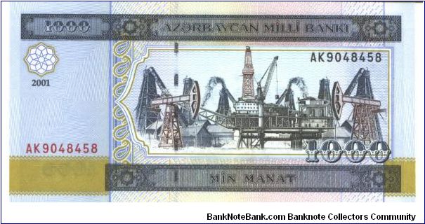 Slate blue on light blue and multicolour underprint. Oil rigs and pumps at center right. Value on back. Banknote