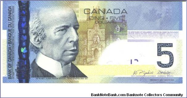 Blue-and tan-yellow. Sir Willfred Laurier at left, west block of Parliament at center. Winter sports - xhildren skating, tobogging and playing hockey on back. Signature Knight-Dodge. Banknote