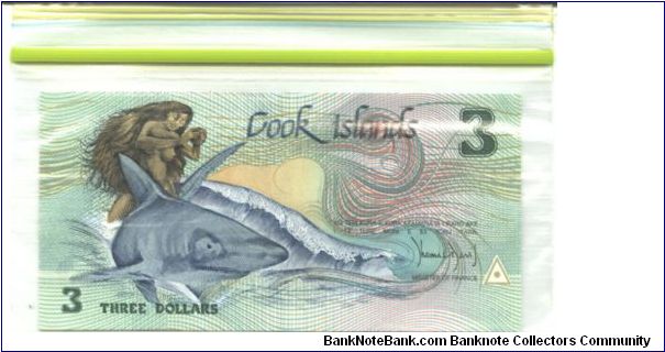 Deep green, blue and black on multicolour underprint. Fishing canoe and statue of the god of Te-Rongo on back. Banknote