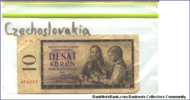 Brown on multicolour underprint. 2 girls with flowers at right. Orava Dam. Printer STC_ Praque. Printed wet photogravue or dry photogravue. Banknote
