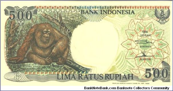 Brown and green on multicolour underprint. Orangutan resting on limb at left. Native huts at E. Kalimantan at right on back. Watermark: H. O. S. Cokroainoto Banknote