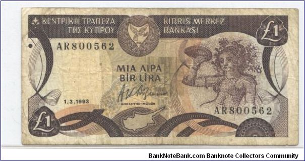 Like #50 but with bank name in unbroken line of micro-printing with Greek at left and Turkish at right just below upper frame. Banknote