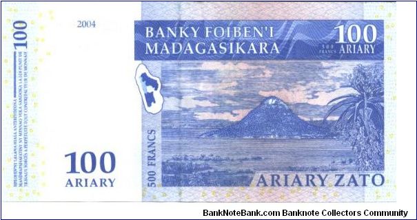 Blue and tan on multicolour underprint. Banknote