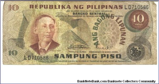 Like #144, 149

Brown on multiclour underpint. A. Mabini at left and as watermark. Barasaoain Church on back.

Central Bank Seal Type 2. Overprint: ANG BAGONG LIPUNAN on watermark area, 1974-1985.

Signature 8 Banknote