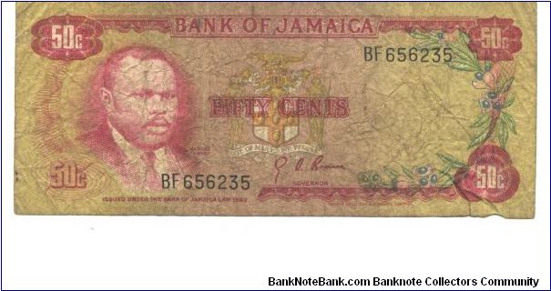 Red on multicolour underprint. Marcus Garvey at left, arms in underprint at center. National shrine at right on back. Banknote