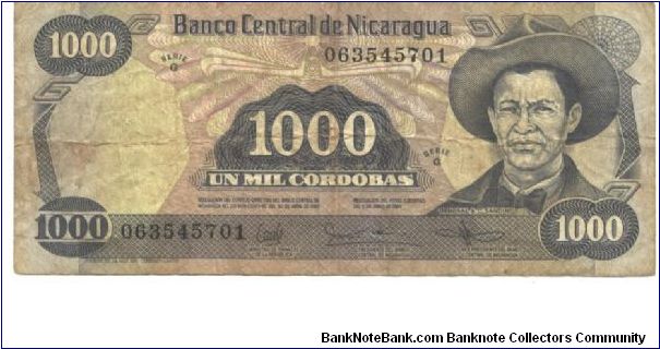 Like #139 143

Blue-gray on multicolour underprint. Engraved. Grn. A. C. Sardino at right. Hut (sandino's birthplace) on back. Signature varieties. Banknote