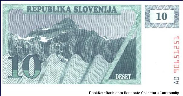 Dark blue-green and grayish purple on light blue-green underprint.

Issued note Banknote