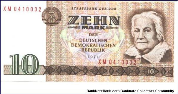 East Germany

Brown on multicolour underprint. Clara Zetkin at right. Woman at radio station on back. Banknote