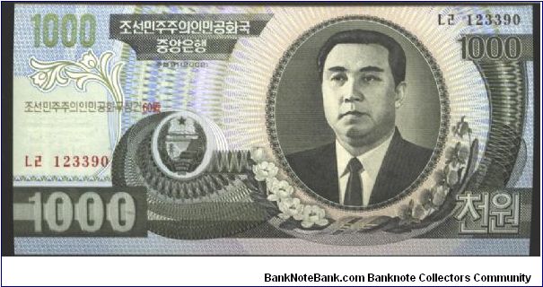 Like #243

Dark green on multicolour underprint. Back slate blue on multivolour underprint.

Arms at lower left center. Kim Il Sung at right. Rural home at center on back.

Watermark: Arched Gateway Banknote